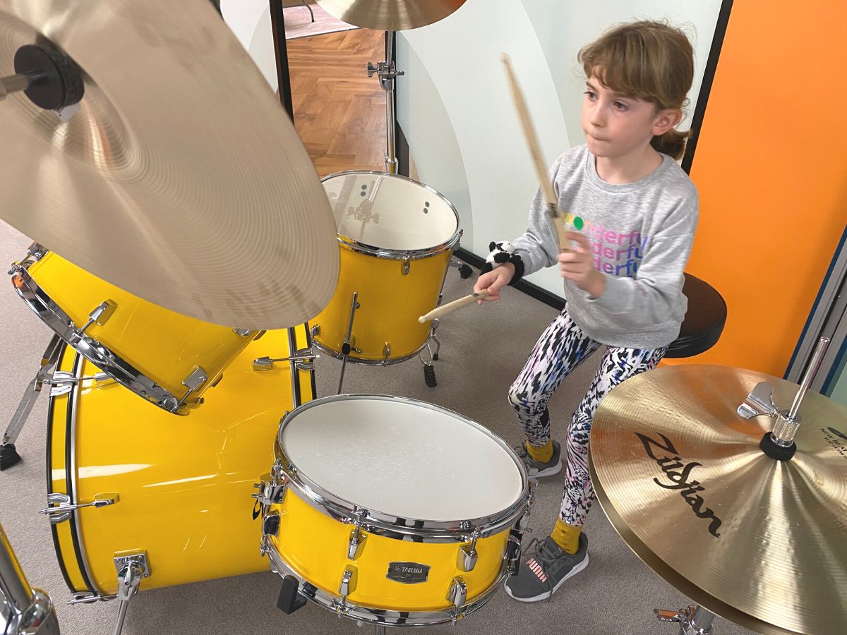 A child playing the drums