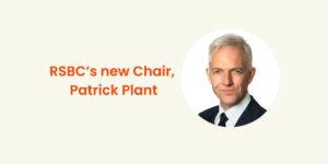 A beige rectangle graphic showing an head shot of the new RSBC's chair with an orange text that reads: