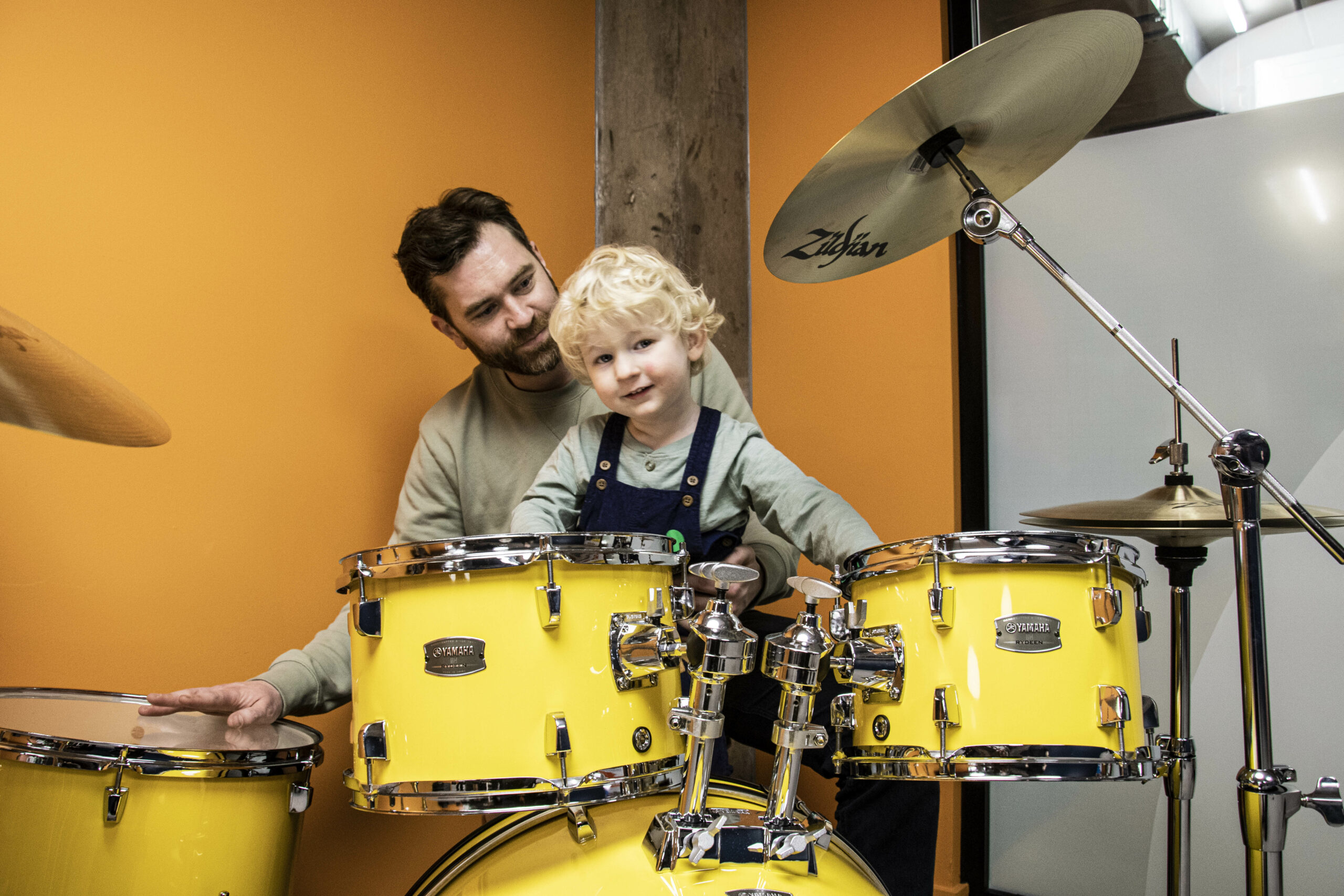 A father and son druming