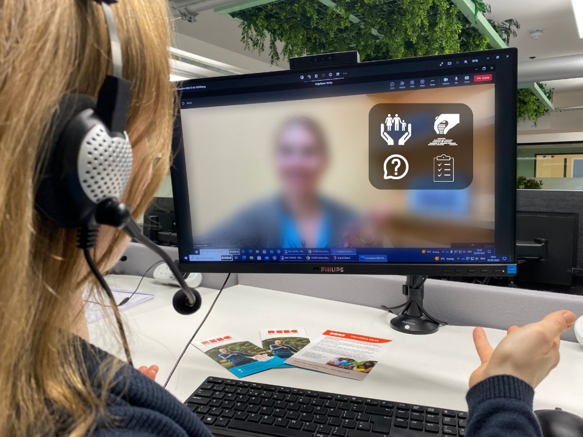 2 women having a conversation online. One woman is talking with a headphone in front of a screen and another woman is appearing blurred on the screen. 4 icons representing family support, help, money and paperwork are also visible on the screen.