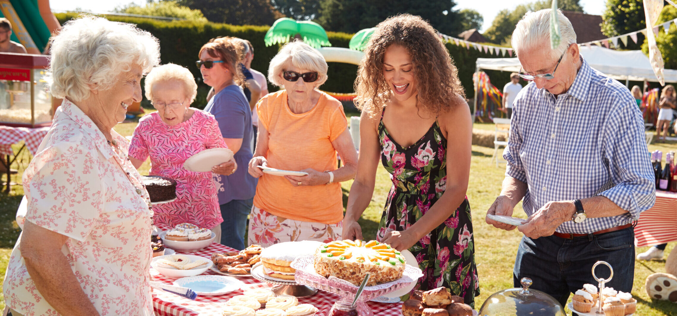 Busy Cake Stall At Summer Garden event.