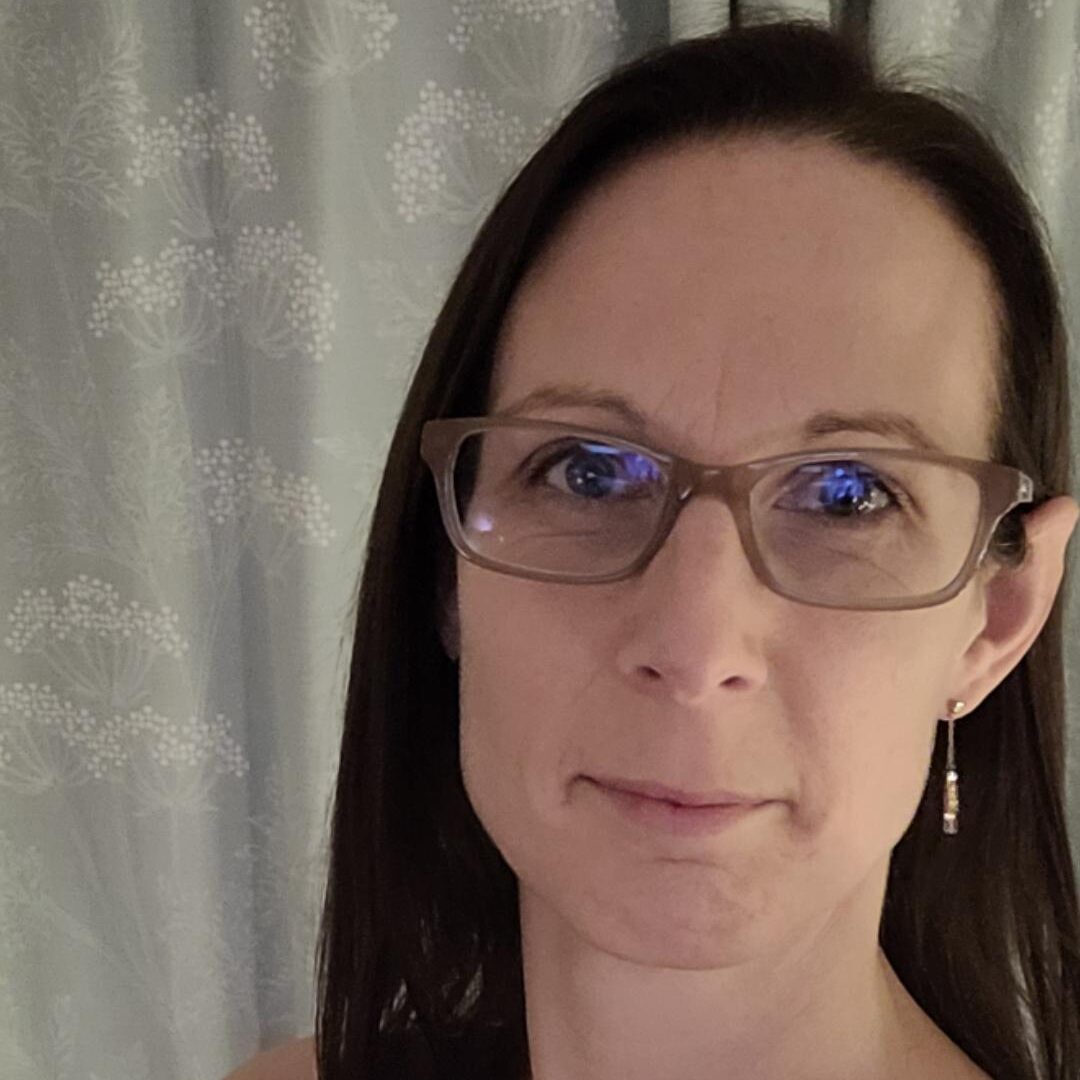 Headshot of Helen, the Head of Relationship Fundraising for RSBC. Helen is a light-skinned woman with shoulder length brown hair. She is wearing light brown glasses and silver earrings.